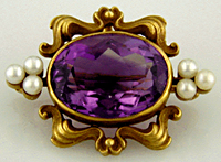 Amethyst and pearl fin de siecle brooch.